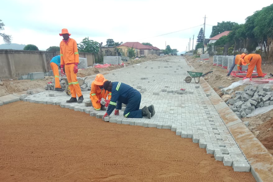 employee laying bricks